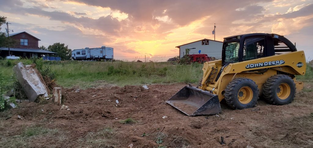 Tree Removal and Trimming - Patriot Tree Experts - Sunset with skid steer